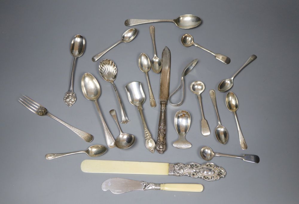 A silver-mounted and ivory page turner and a small collection of silver flatware, Georgian and later,